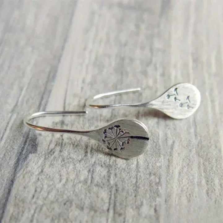 Victoria Elegant Silver Earrings in Dandelion Leaf Design |