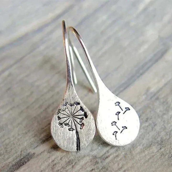 Victoria Elegant Silver Earrings in Dandelion Leaf Design |